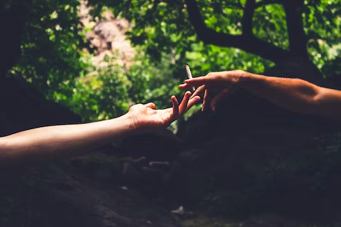 two hands almost touch with a joint in creation of adam style(1)